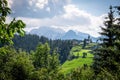 Church Cerkev Sveti Duh with mountain range KamnikÃ¢â¬âSavinja Alps Royalty Free Stock Photo